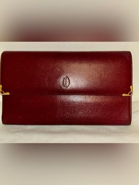 Cartier Burgundy Leather Must deCartier
Trifold Continental Wallet